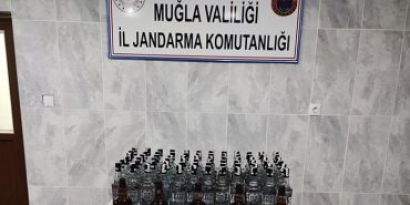 YOL KONTROLÜNDE SAHTE BANDROLLÜ İÇKİ ELE GEÇİRİLDİ YATAĞAN İLÇESİ GİRİŞİNDE JANDARMA EKİPLERİ TARAFINDAN GERÇEKLEŞTİRİLEN YOL KONTROLÜNDE SAHTE BANDROLLÜ İÇKİ ELE GEÇİRİLDİ.